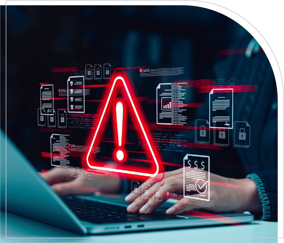 A laptop screen shows a digital warning alert, representing asset scheduling risks