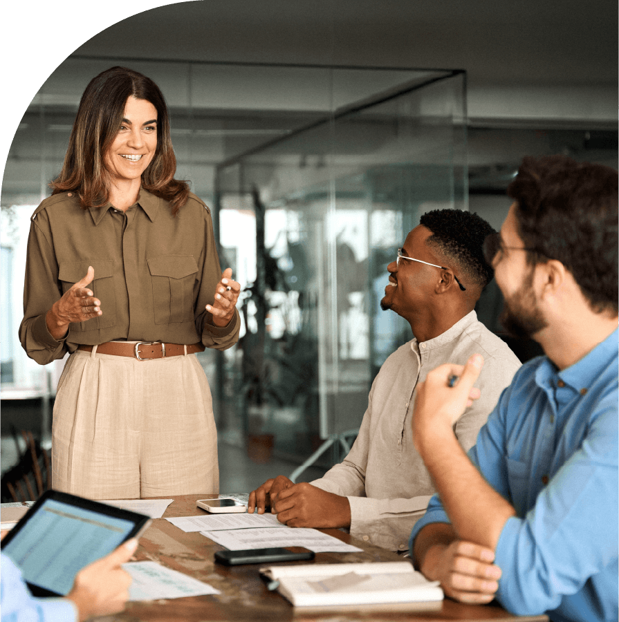 The team take part in a meeting, with one team member guiding the discussion