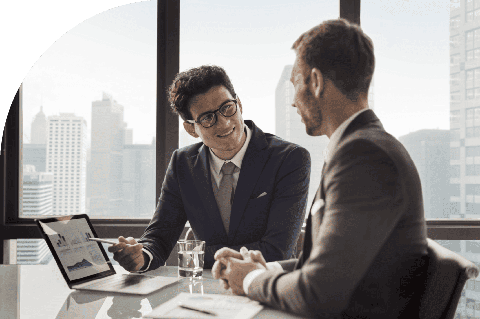 Professionals discussing realized value and investment performance
