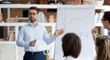 The team is defining project deliverables and determining ways to manage them effectively